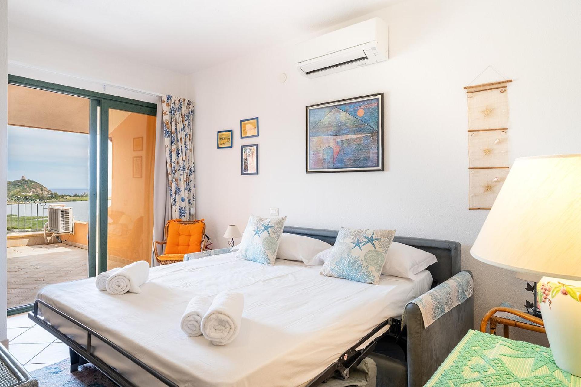 Casa Daniela, Vista Mare Sea View Apartment Chia Luaran gambar